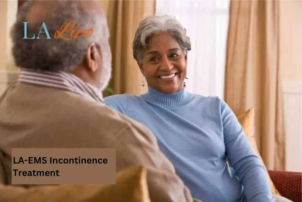 Couple sat smiling at each other - LA-EMS treatment Upton