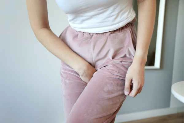 woman running for the toilet because of urinary incontinence Upton